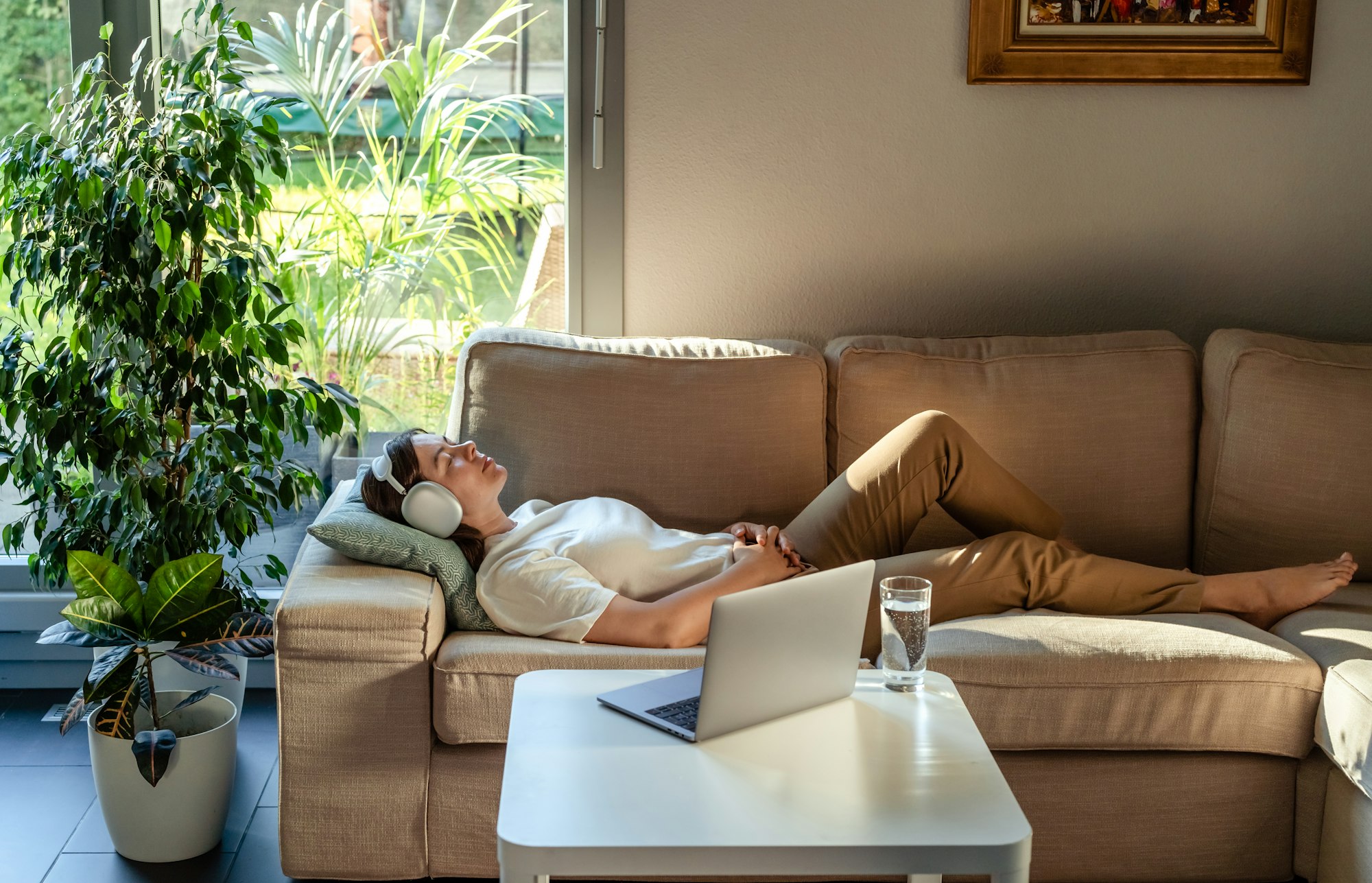 Young woman having online hypnotherapy healing session